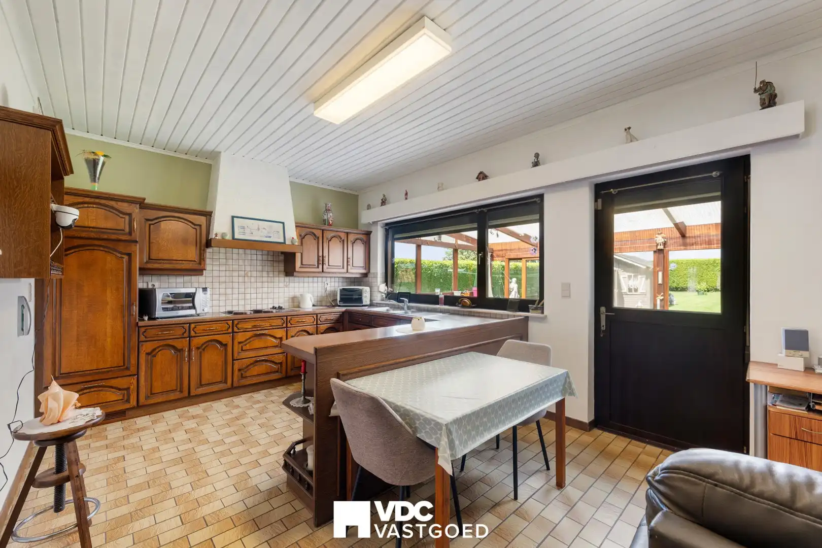 Ruime gelijkvloerse woning op een perceel van bijna 10 are foto 12