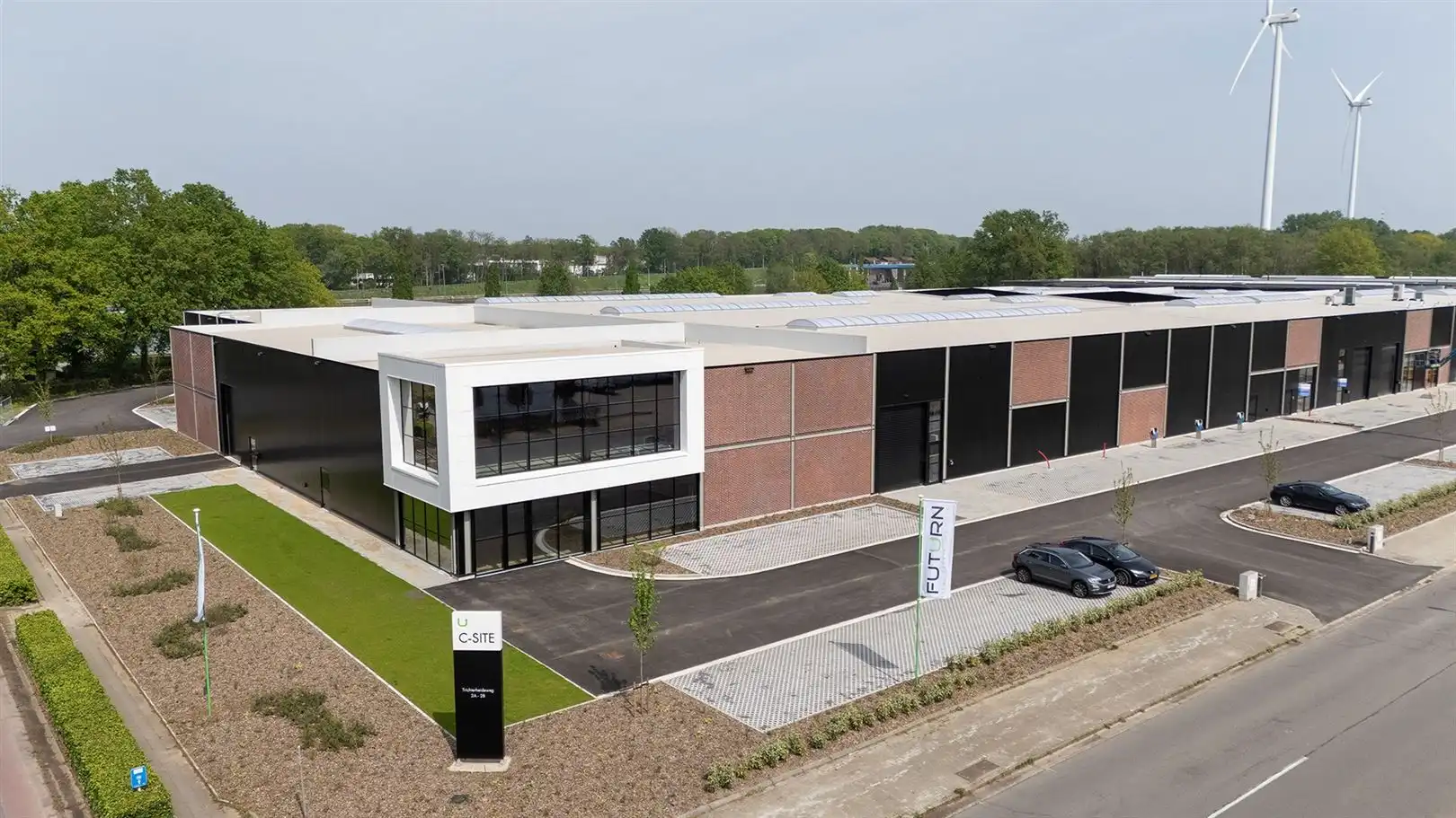 Nieuwbouw KMO units op bedrijvenpark C-Site te Hasselt foto {{pictureIndex}}