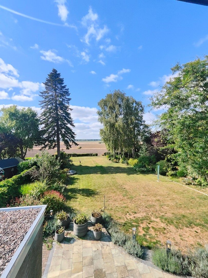 Stijlvol gerenoveerde vrijstaande villa met panoramisch uitzicht op de polders – gelegen op ca. 1.280 m² in het charmante Aardenburg! foto 21
