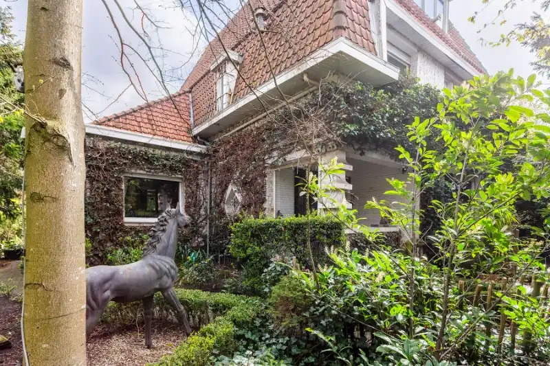Karaktervolle, cottage villa in een oase van groen, na renovatie een parel! foto 10