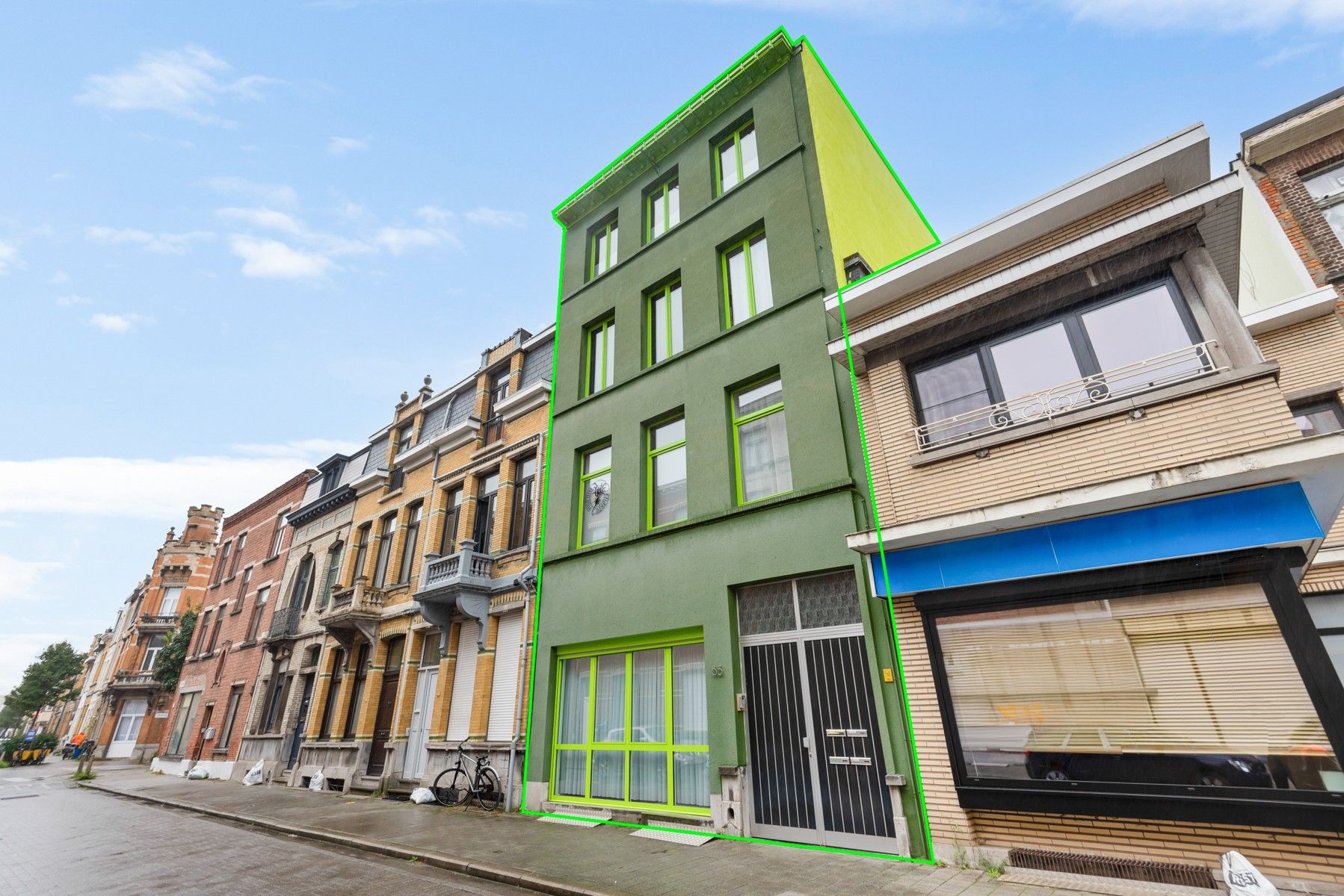 Ruime en unieke stadswoning met 5 slaapkamers, 2 keukens en sfeervolle stadstuin foto 2