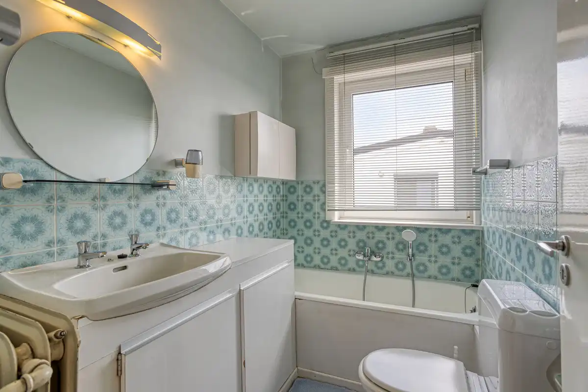 Te verfraaien woning - ruime tuin en garage foto 21