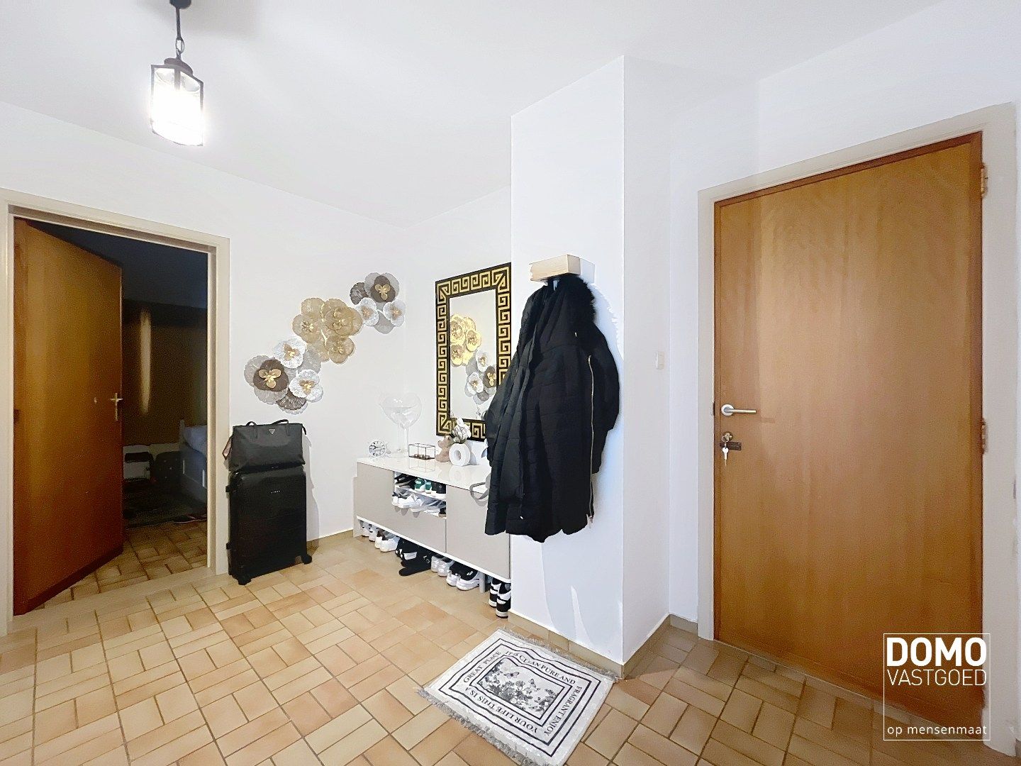 GELIJKVLOERS APPARTEMENT MET 2 SLAAPKAMERS EN GARAGE GELEGEN IN HET CENTRUM VAN BERINGEN foto 6