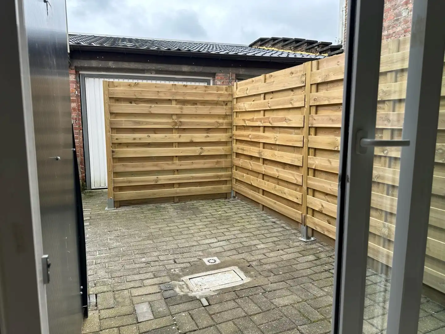 Te huur in Merchtem: compact 1-slpk-appartement met terras foto 4