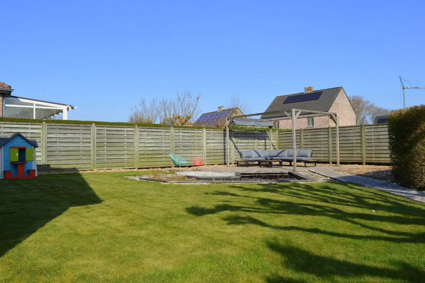 Instapklare woning met 3 slaapkamers, garage en een mooi stukje tuin te koop in residentiële wijk te Aalbeke foto 19