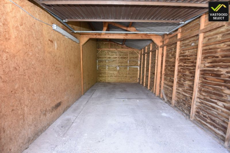 Vastgoed Select: Halfopen bebouwing met zonnige tuin, garage en renovatiepotentieel in Eeklo foto 13