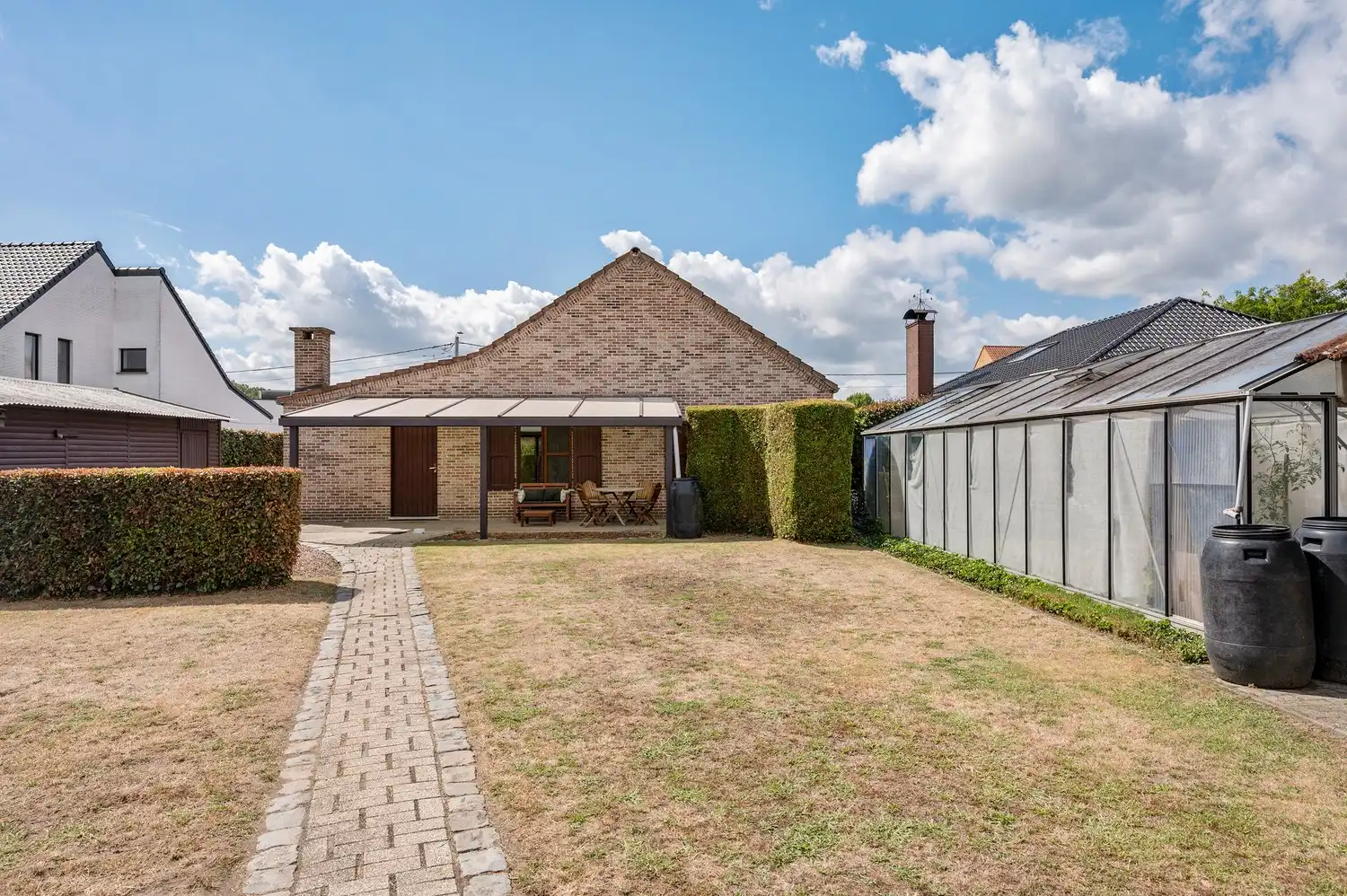 Instapklare open bebouwing op een ruim perceel van 1.185 m², landelijk gelegen met een prachtig vrij uitzicht aan de achterzijde. foto 39