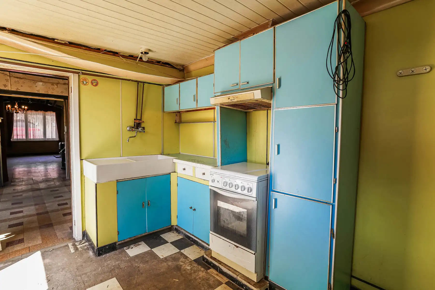Te renoveren rijwoning met tuin te Kapelle-op-den-Bos foto 9