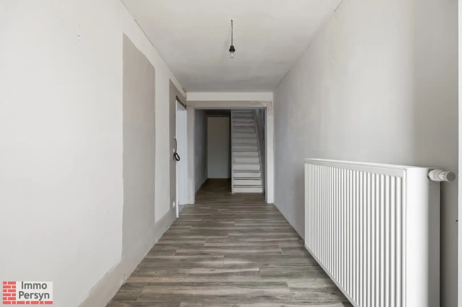 Ruime af te werken woning met nieuw dak, vernieuwde elektriciteit en diepe tuin  (EPC D) foto 12
