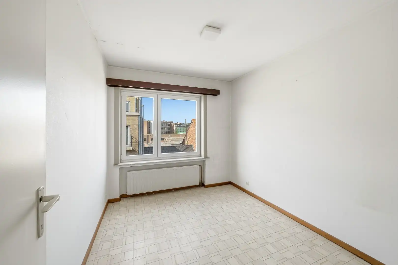 Op te frissen appartement met zicht op het Sint-Catharinaplein in Oostende foto 13
