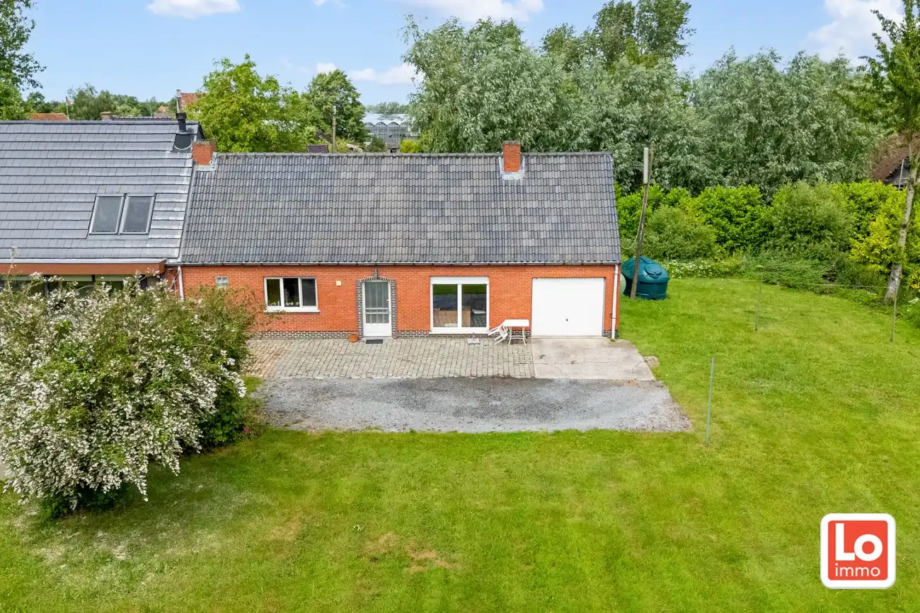 Landelijke te renoveren halfopen gelijkvloerse woning met inpandige garage en grote tuin met open zicht op een makkelijk bereikbare locatie in Zeveneken! foto 25