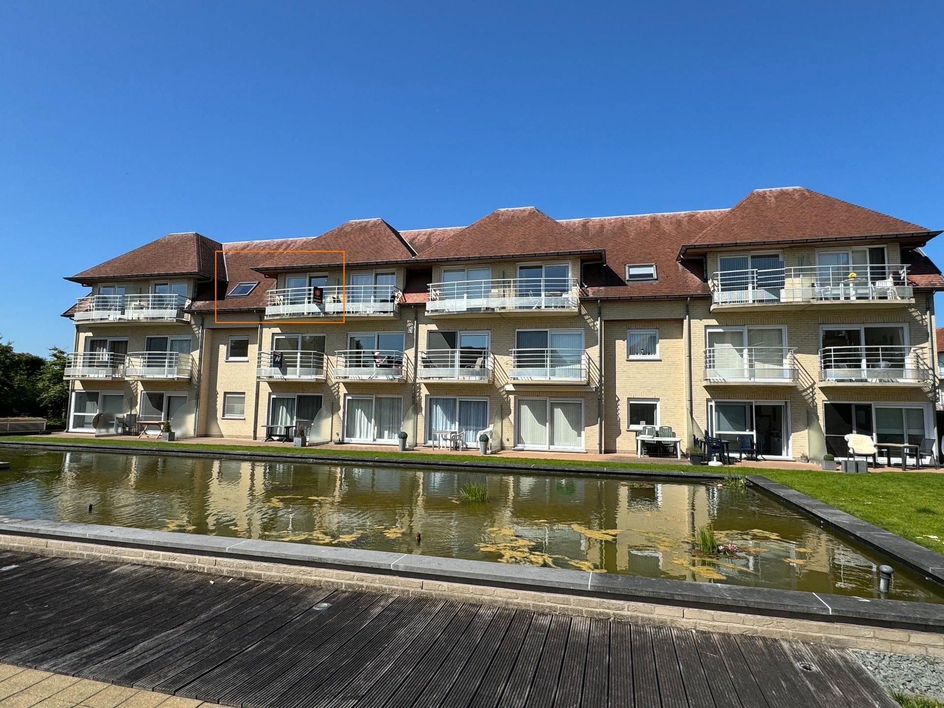 Modern & comfortabel appartement met terras, zwembad én vijverzicht aan het bos van De Haan te koop. foto 9