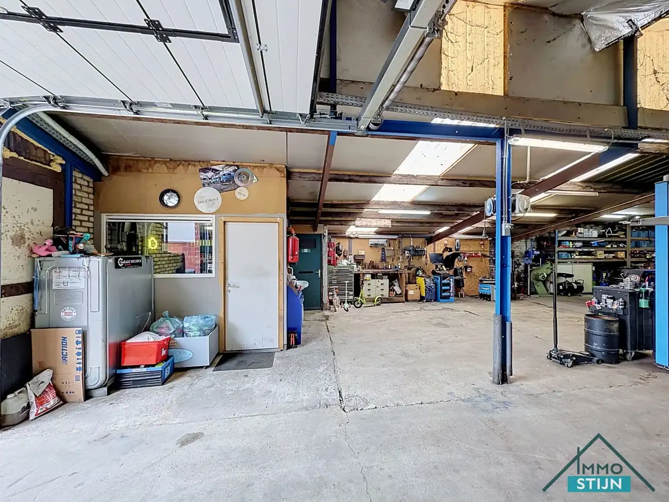 Instapklare woning met werkplaats foto 18
