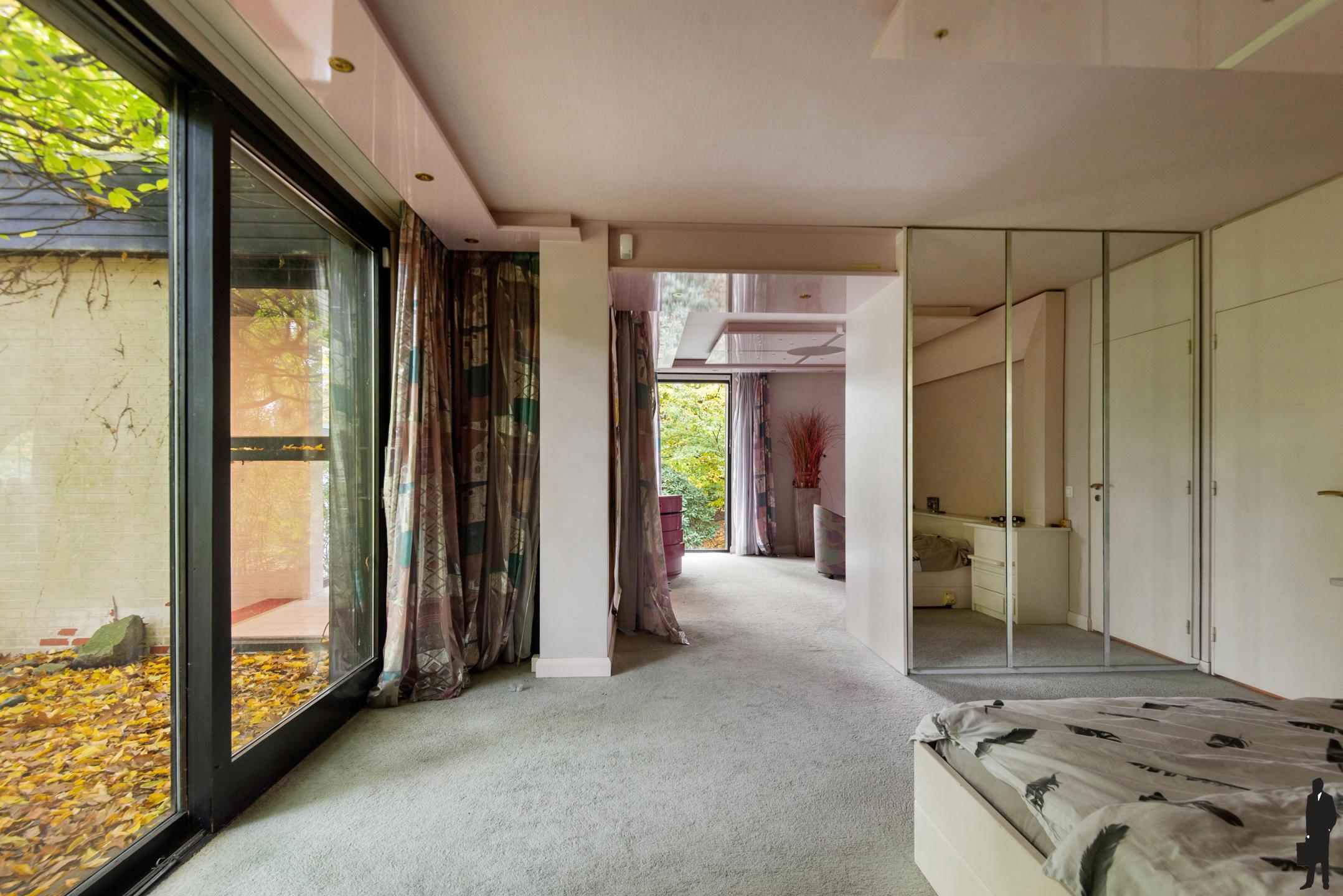 Verscholen in de natuur, in 1 van de mooiste lanen van Vriesdonk, rustig en residentieel: Architectenwoning op ca. 5.710 m².  foto 9