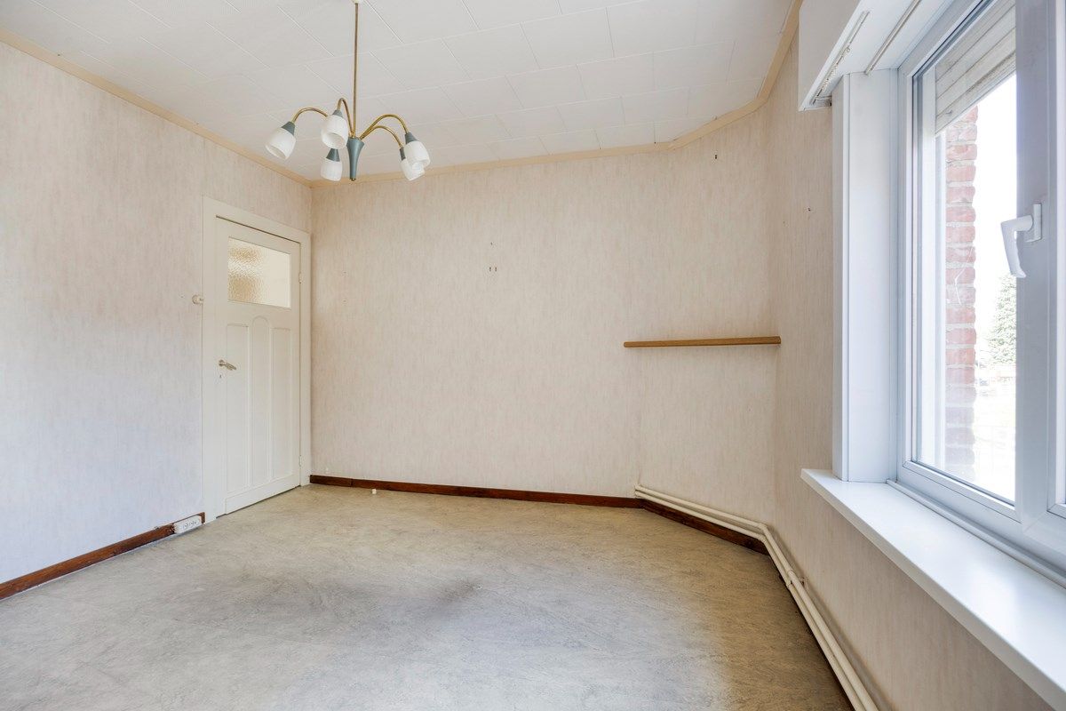 Ruim ingedeelde woning met 3slpks op een gunstige ligging. foto 18