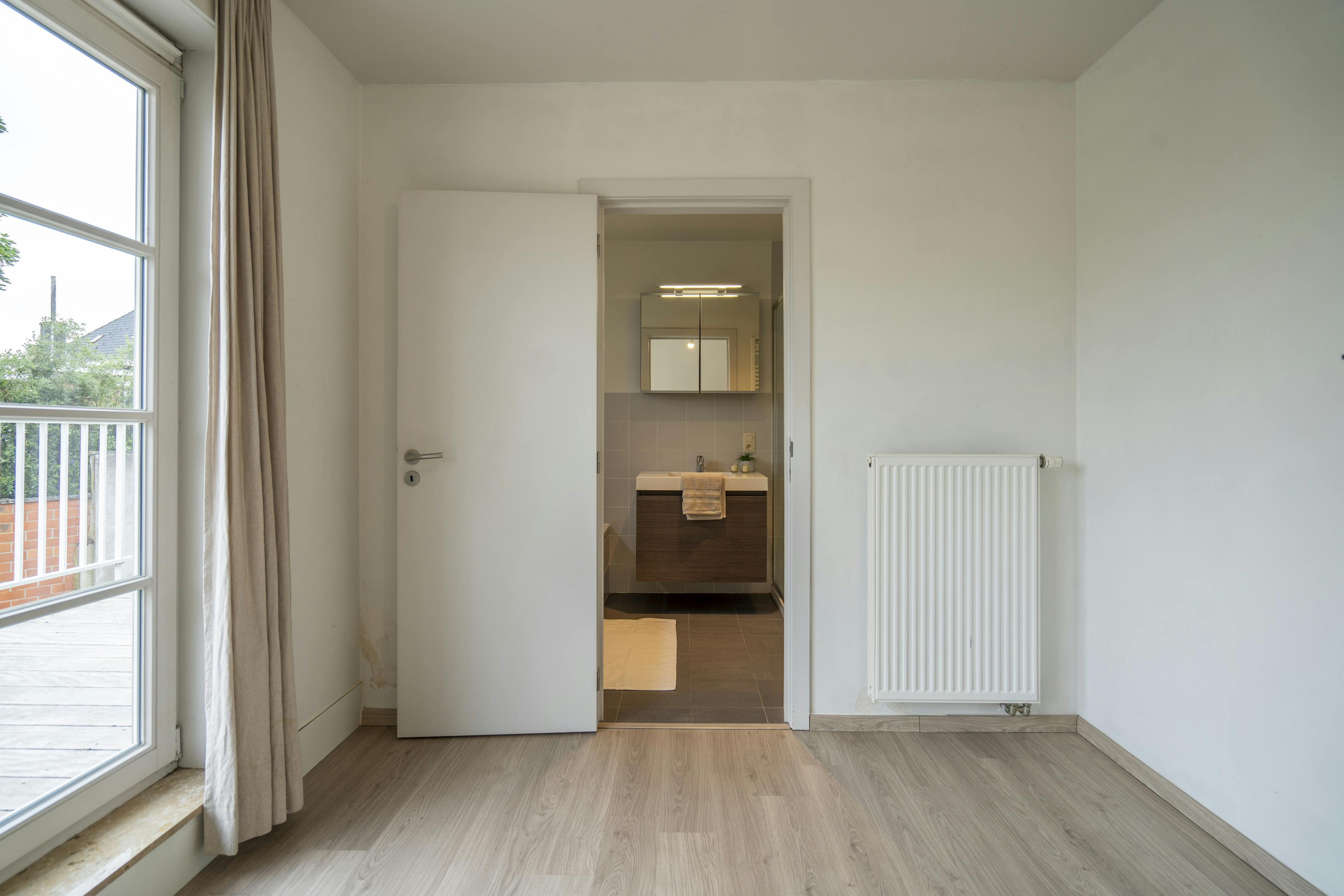 Instapklaar appartement te koop in centrum Ingooigem foto 11