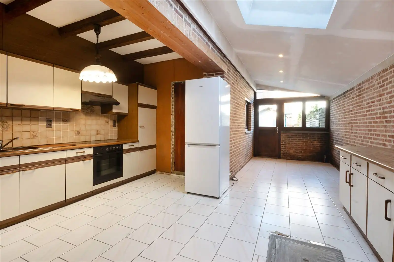 Deels te renoveren stadswoning met tuin op 1are19 foto 5