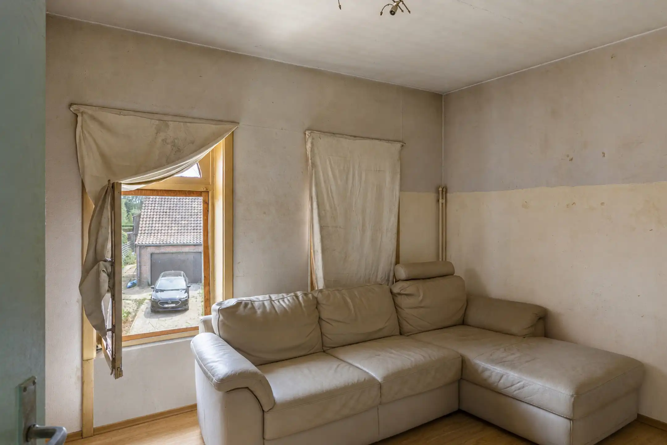 Te renoveren gesloten bebouwing met garage, ruime tuin en groenzicht in Oppuurs foto 15