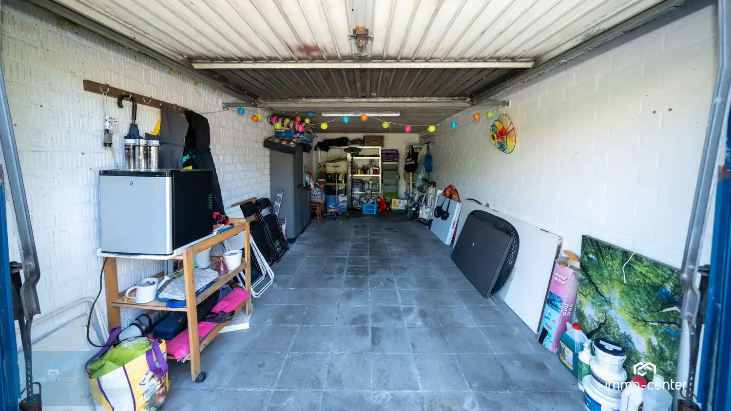 Instapklaar 2-slaapkamer appartement met zolder, 2 garages, carport en prachtige tuin foto 7
