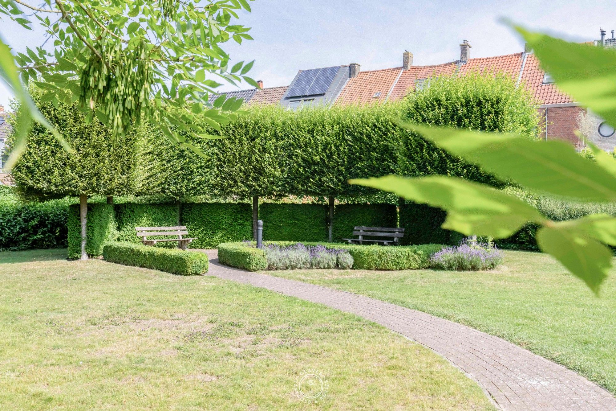 Gelijkvloers appartement met ruim terras en tuintje op een gesloten en groene residentie. foto 16