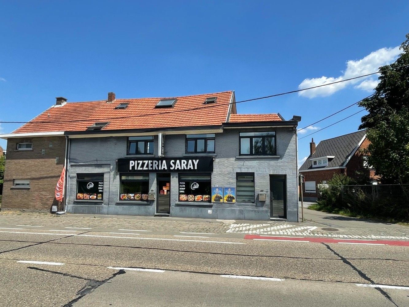 Handelspand met ruim duplexappartement op zichtbare locatie in Herent foto {{pictureIndex}}