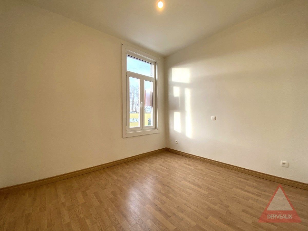 Heule – Woning met tuin op centrale ligging foto 9