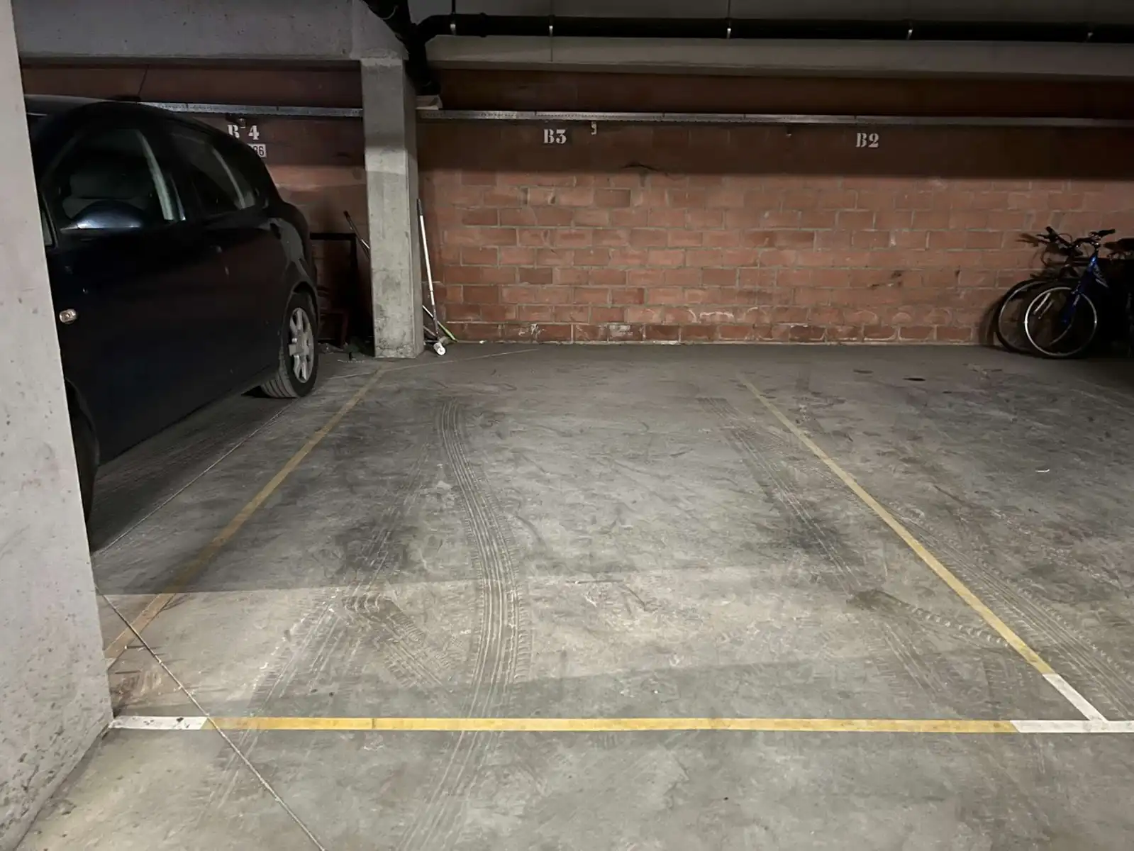 Overdekte, afgelijnde parkeerplaats te koop in centrum Leuven foto 2