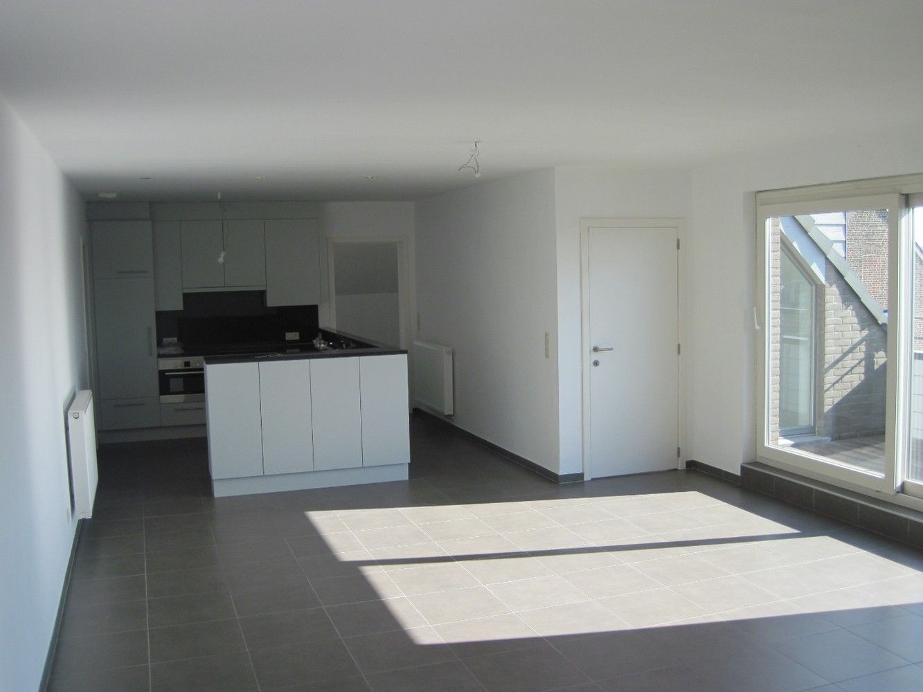 Ruime penthouse met terras en autostaanplaats! foto 4
