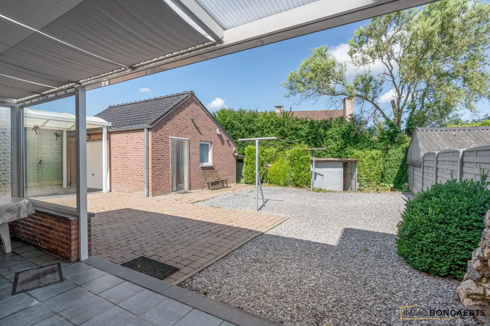 Woning met onderhoudsvriendelijke tuin foto 26