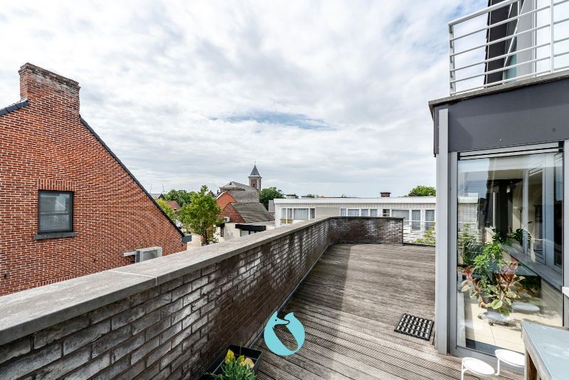 Dit prachtig en ruim appartement met één van de mooiste terrassen te Evergem is gelegen in de Kapellestraat foto 2