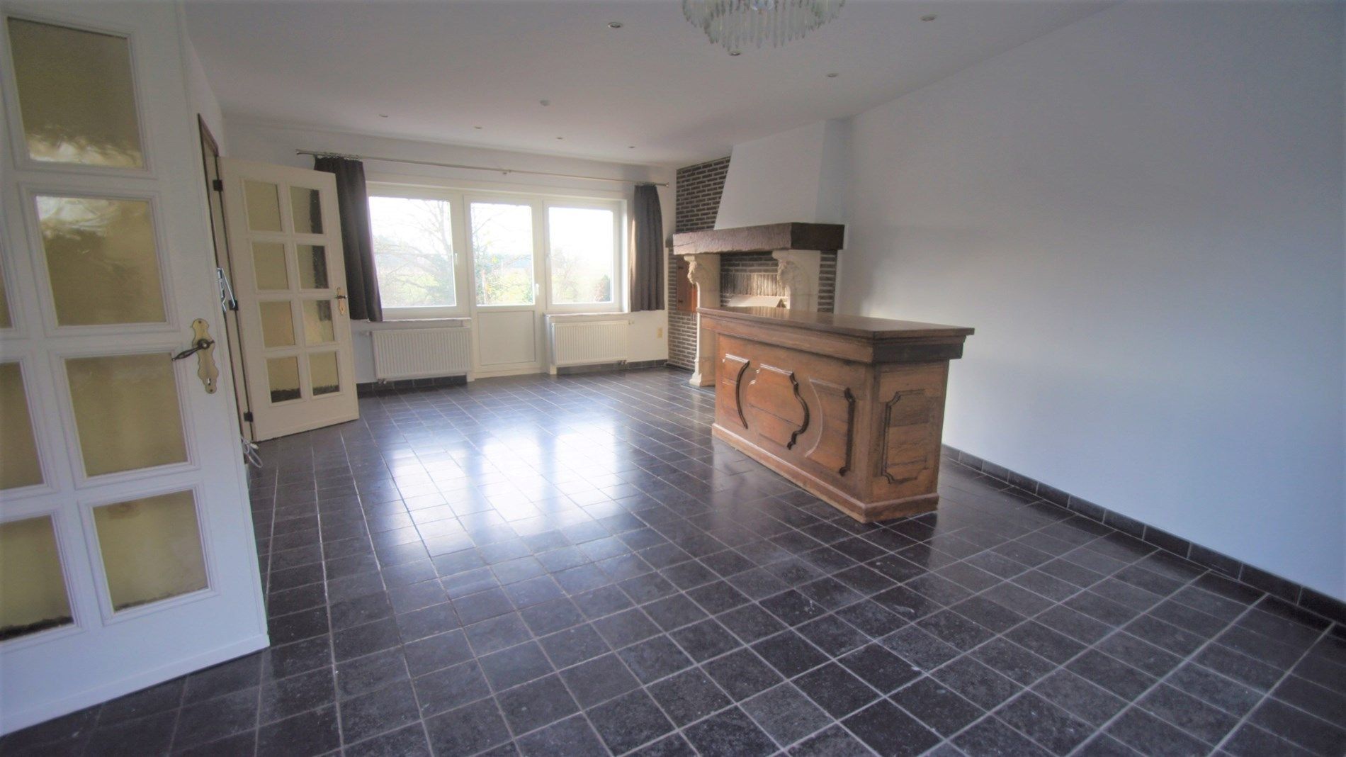 Mooi gelegen woning met tuin/terras, 2 slpks en garage foto 4