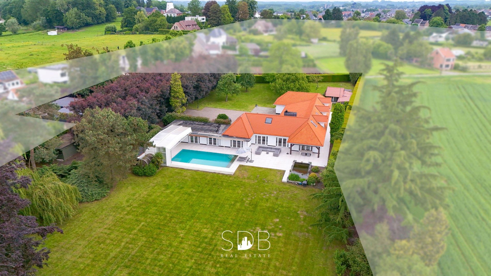 Prachtige villa met zwembad, paardenstallen, paddock en grasland op 1,3HA foto 33