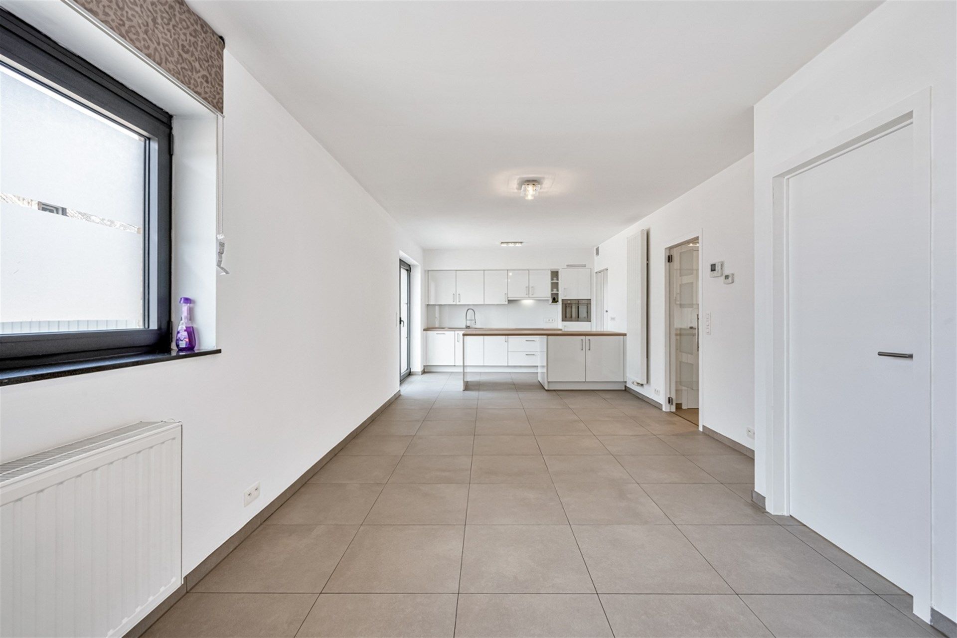 Instapklaar gelijkvloers appartement met zonnig terras foto 2