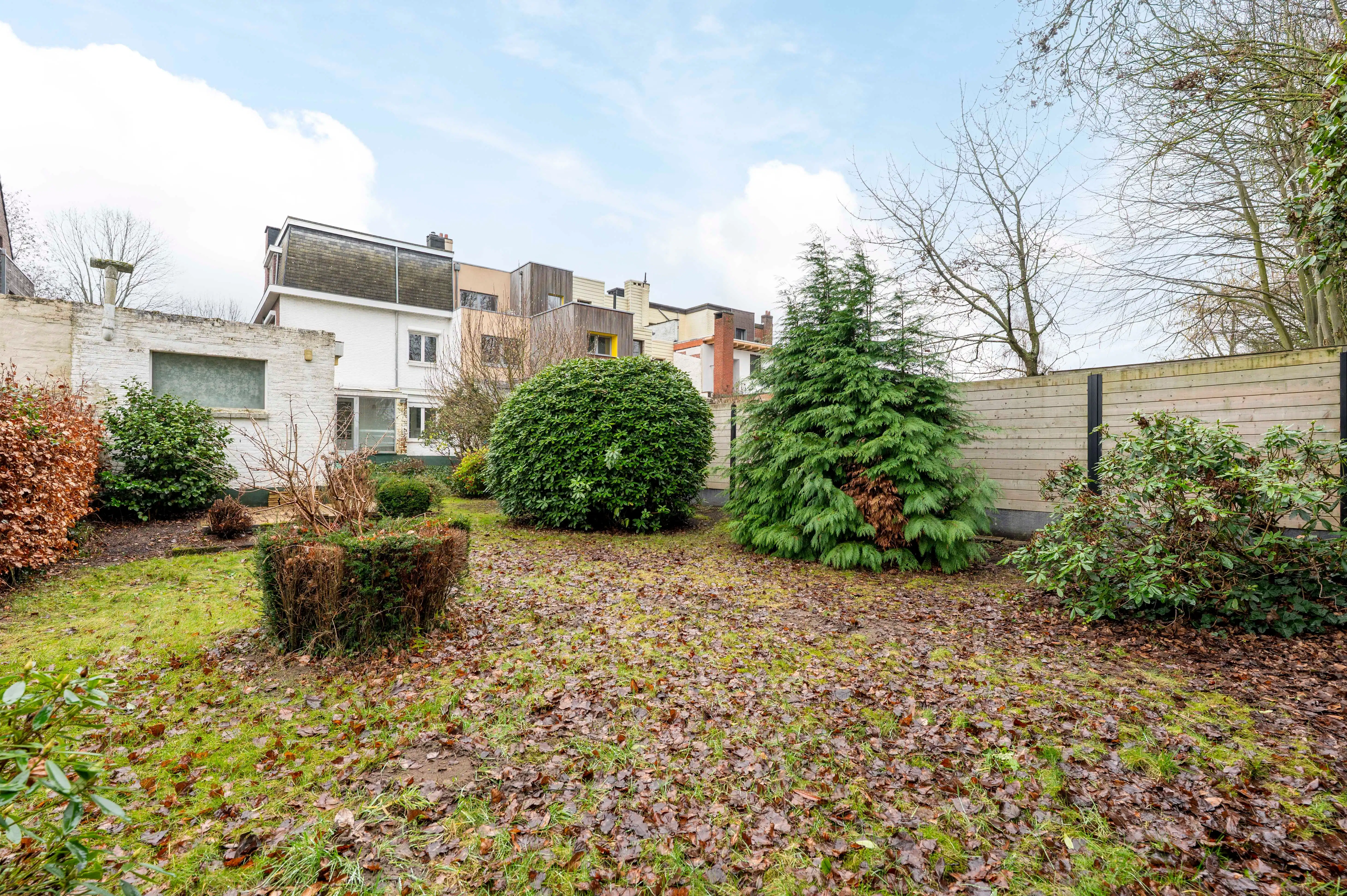 Halfopen bebouwing met veel potentieel, zonnige tuin en garage in Kapellen! foto 12