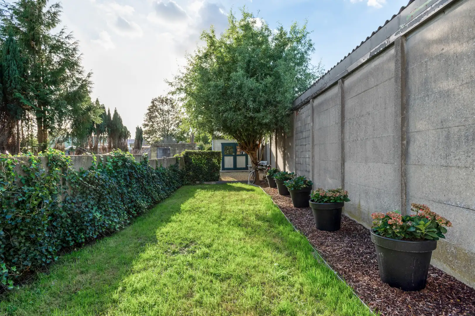 Verrassend ruim en energiezuinig wonen met een zonnige tuin in Schoten! foto 14