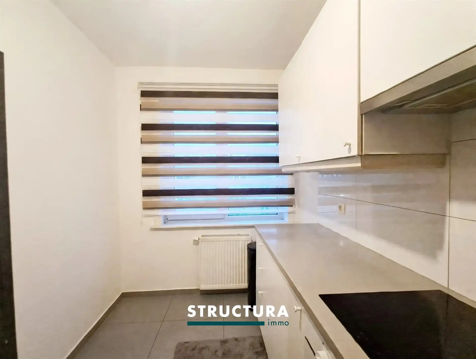 Gerenoveerd appartement in centrum Strombeek-Bever foto 4