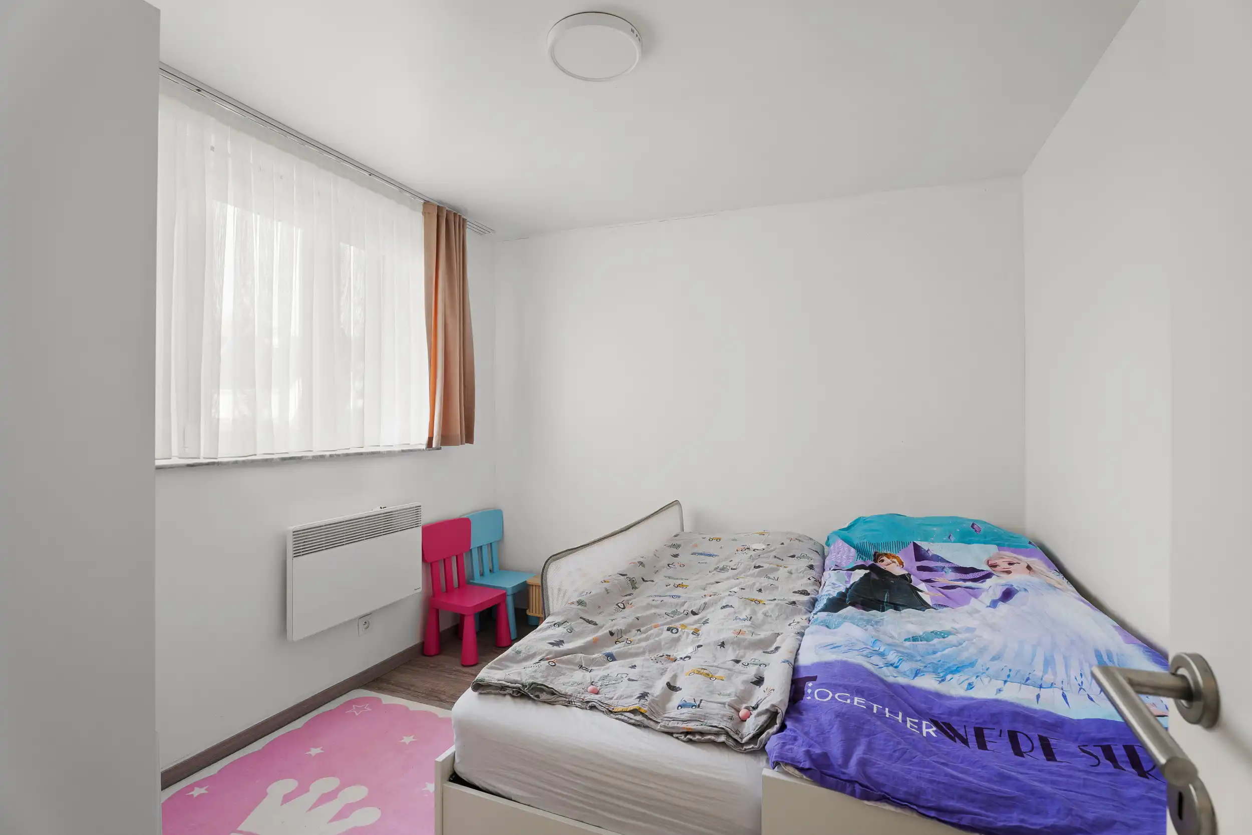 Centrum gelegen gezinswoning met garage en tuin! foto 10