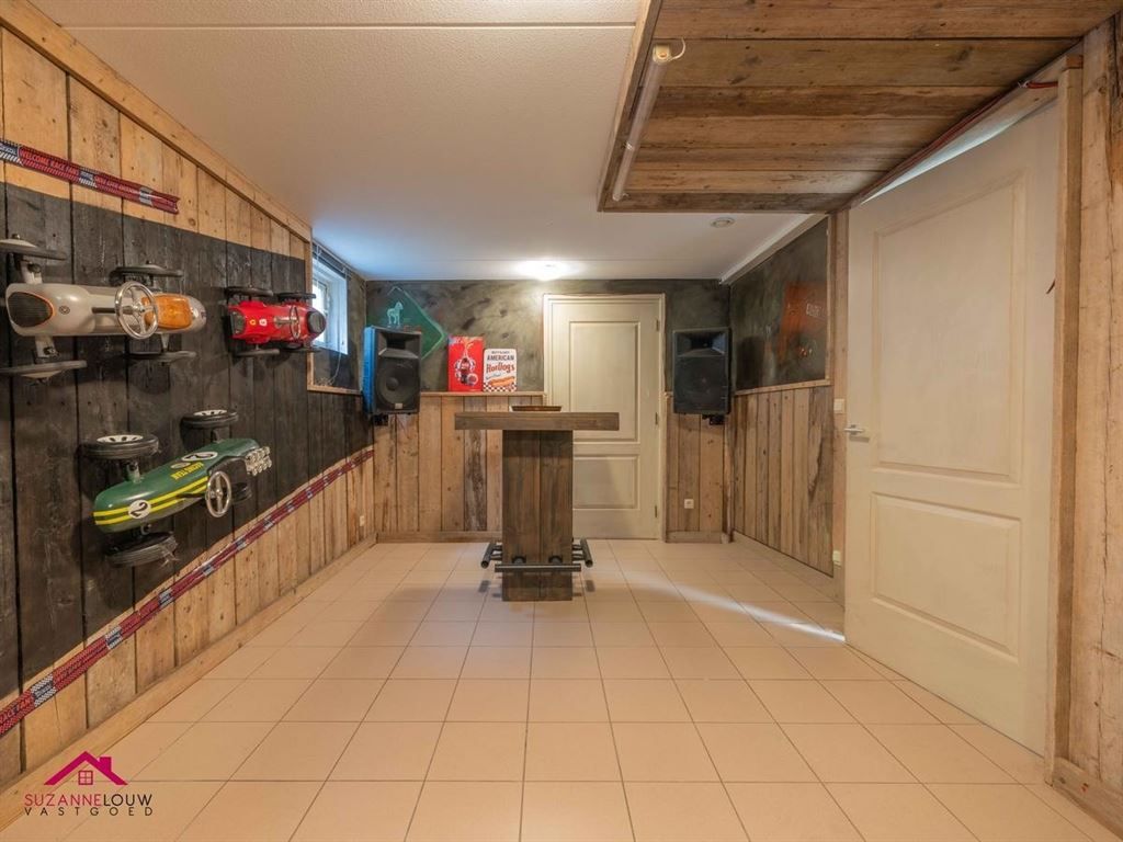 Landelijke villawoning met dubbele vrijstaande garage foto 66