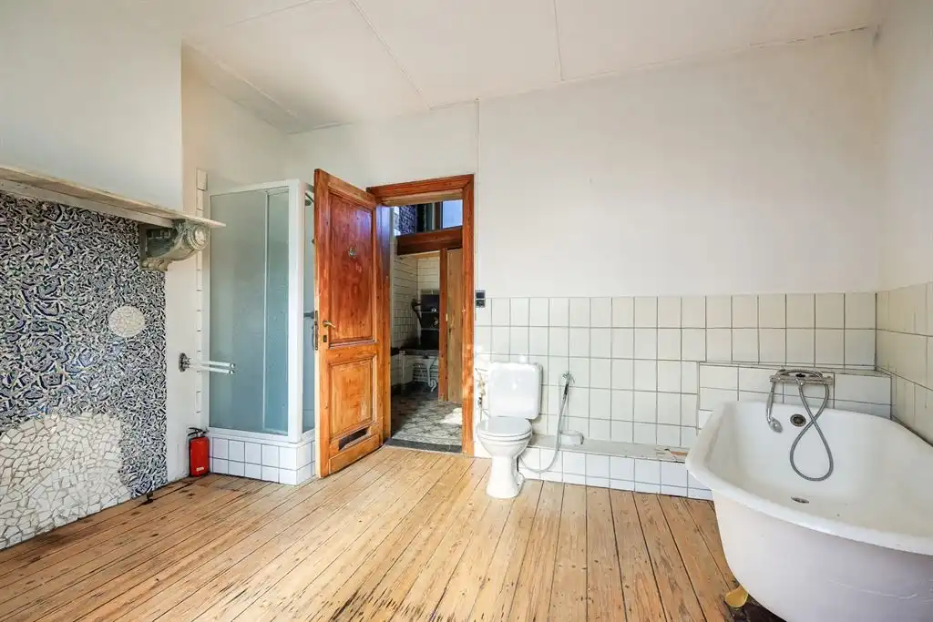 Uitzonderlijke woning met bijzonder magazijn foto 17
