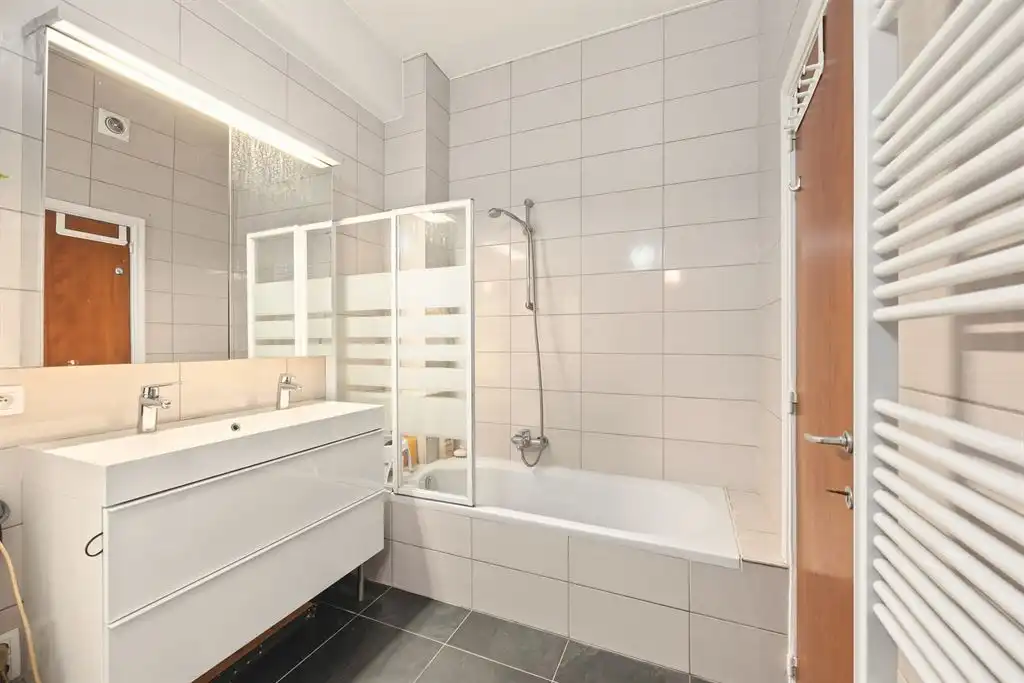 Gelijkvloers appartement met giga tuin foto 11