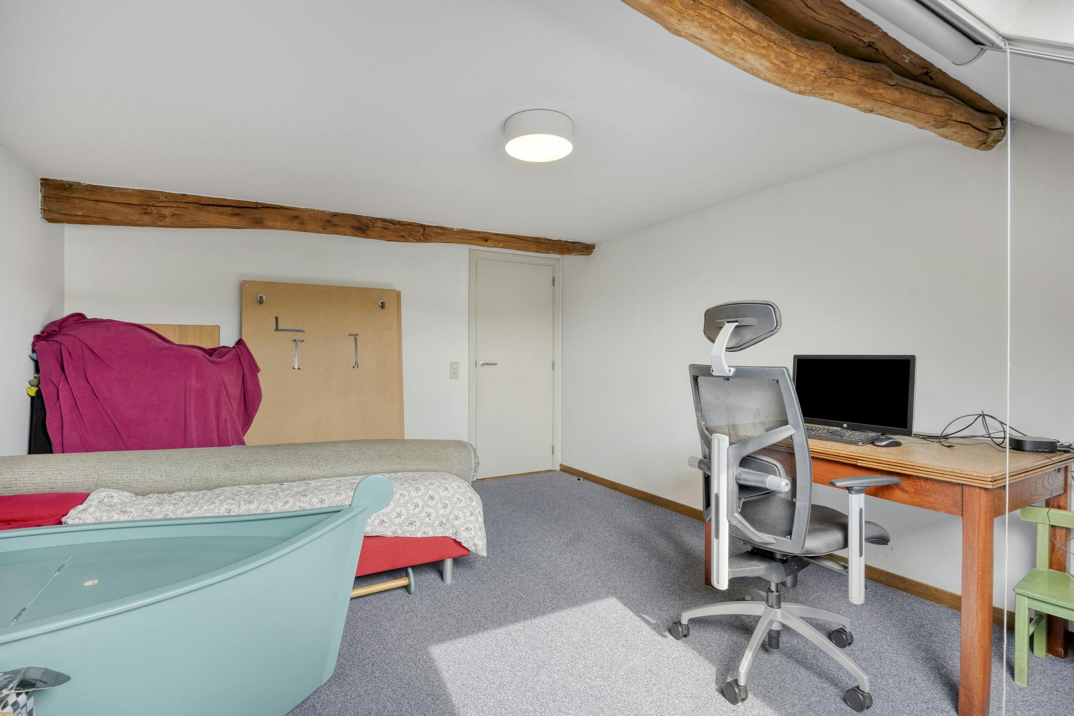 Stijlvolle stadswoning met handelspand te koop in hartje Maaseik foto 28