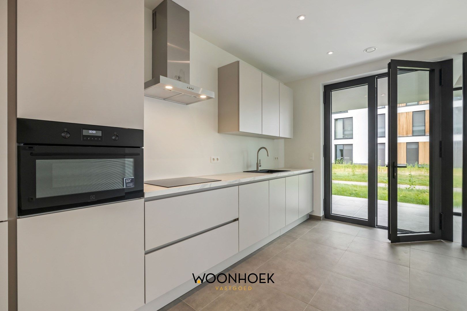 Luxueus 2-slpk nieuwbouwappartement OEVERPARK te Lokeren foto 6