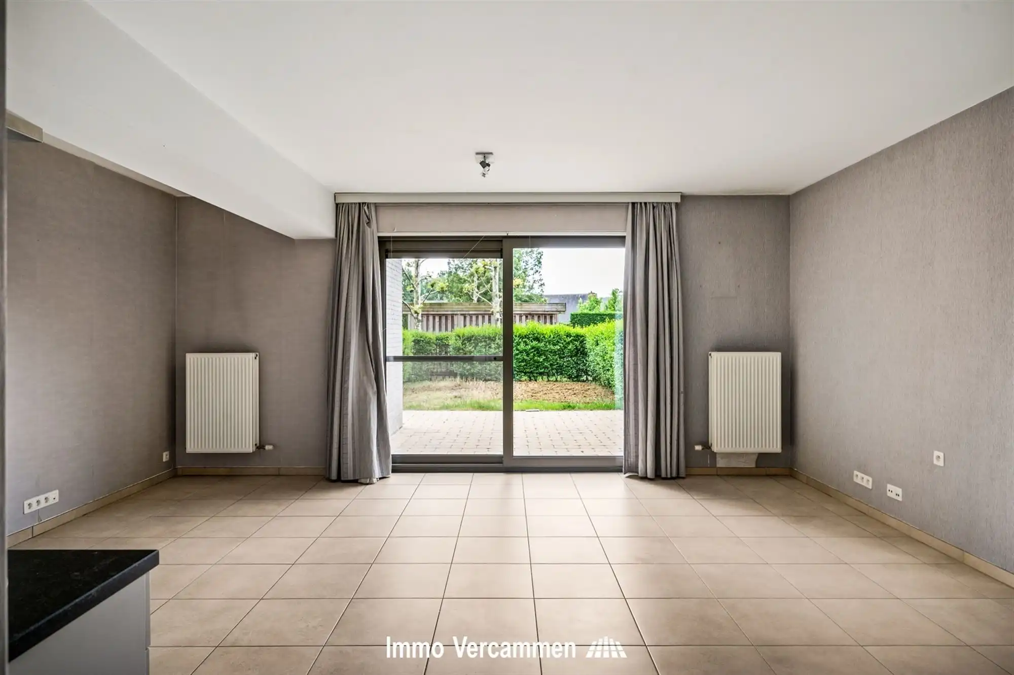 Lichtrijk gelijkvloers appartement met privatieve tuin in Putte foto 3