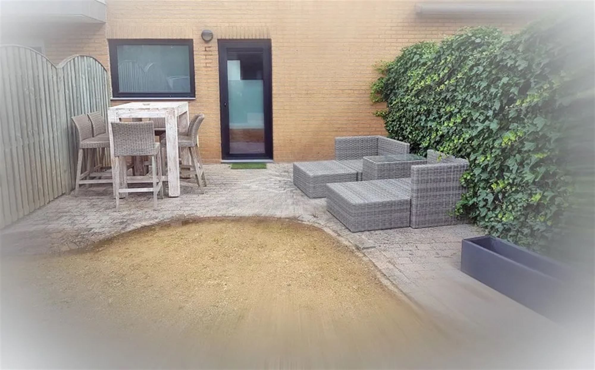 Gezellige gelijkvloerse studio met tuin foto 8