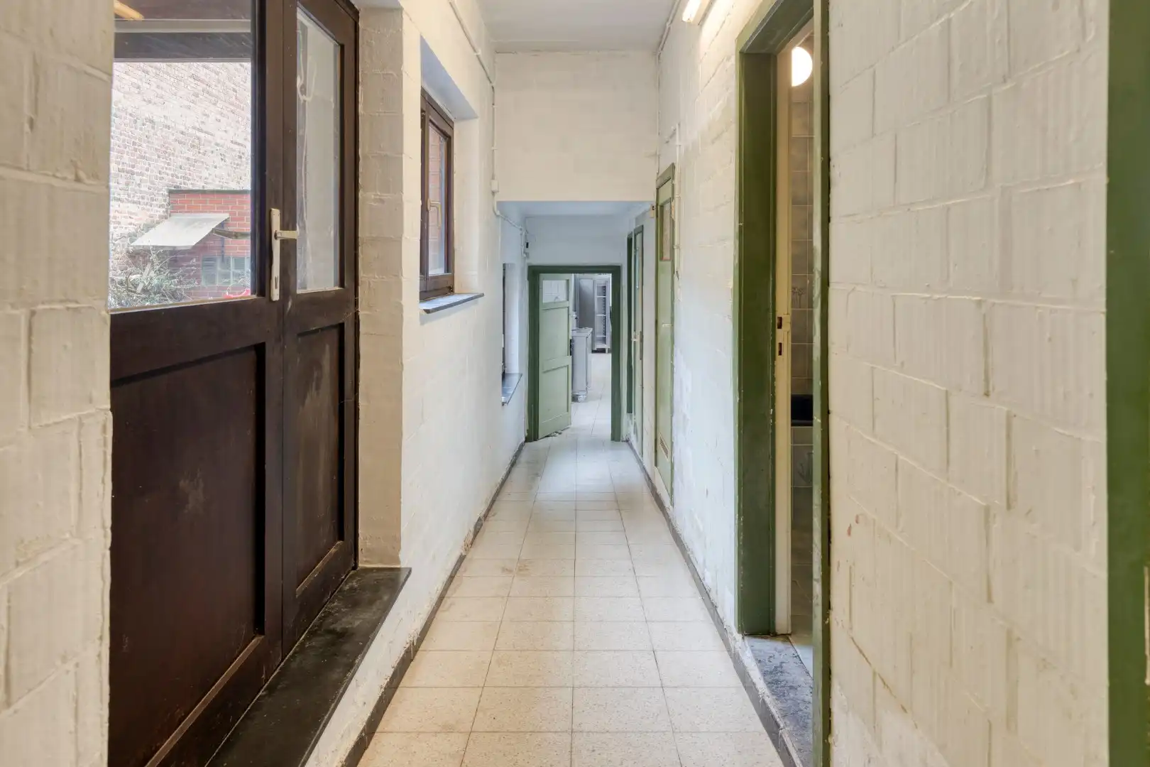 Super gelegen handelspand met garage in Heverlee! - totale oppervlakte +/- 260 m² + kelder van 38m² foto 12