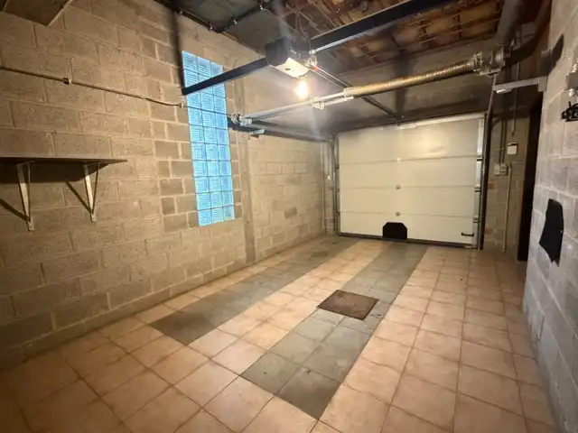 Eengezinswoning met 2 slaapkamers, garage, terras en tuin foto 18