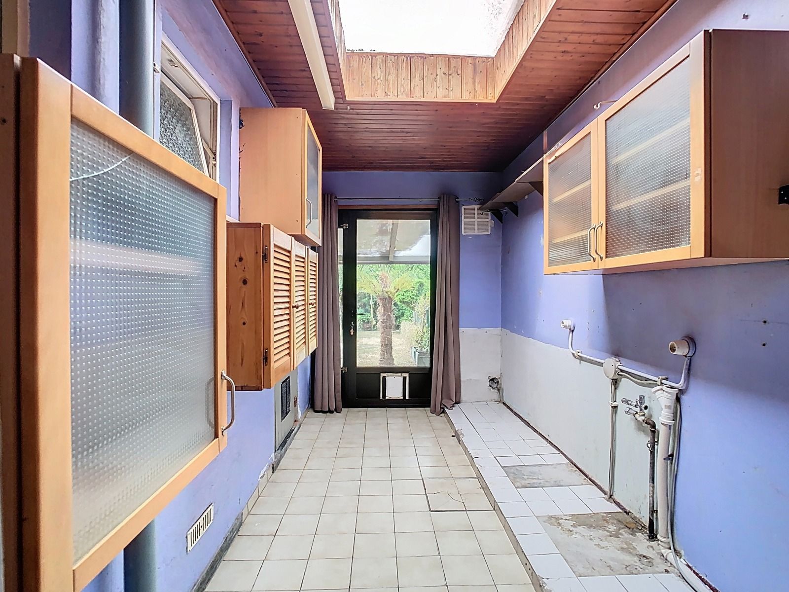 Mooie stadswoning met 2 SLPK,tuin en optionele garage! foto 11