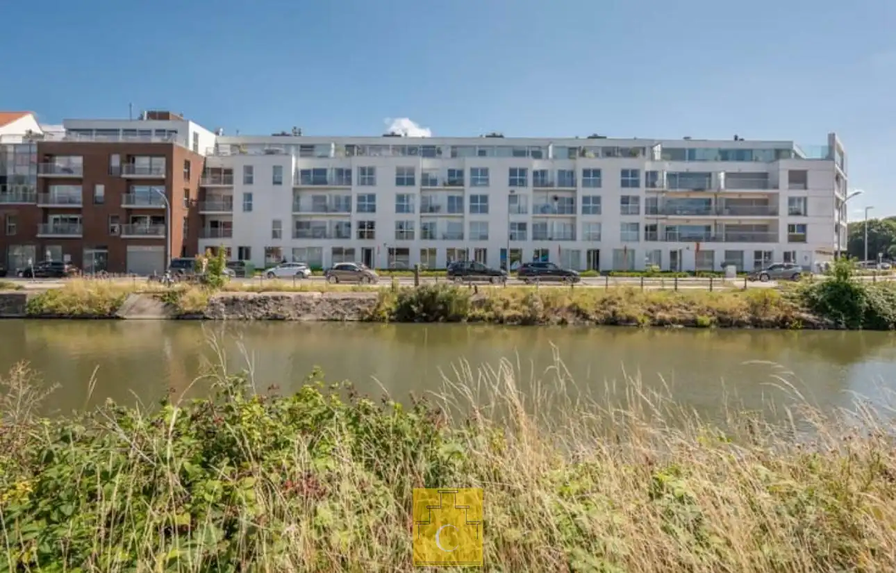 Appartement met zicht op Damse Vaart met terras en autostandplaats foto {{pictureIndex}}