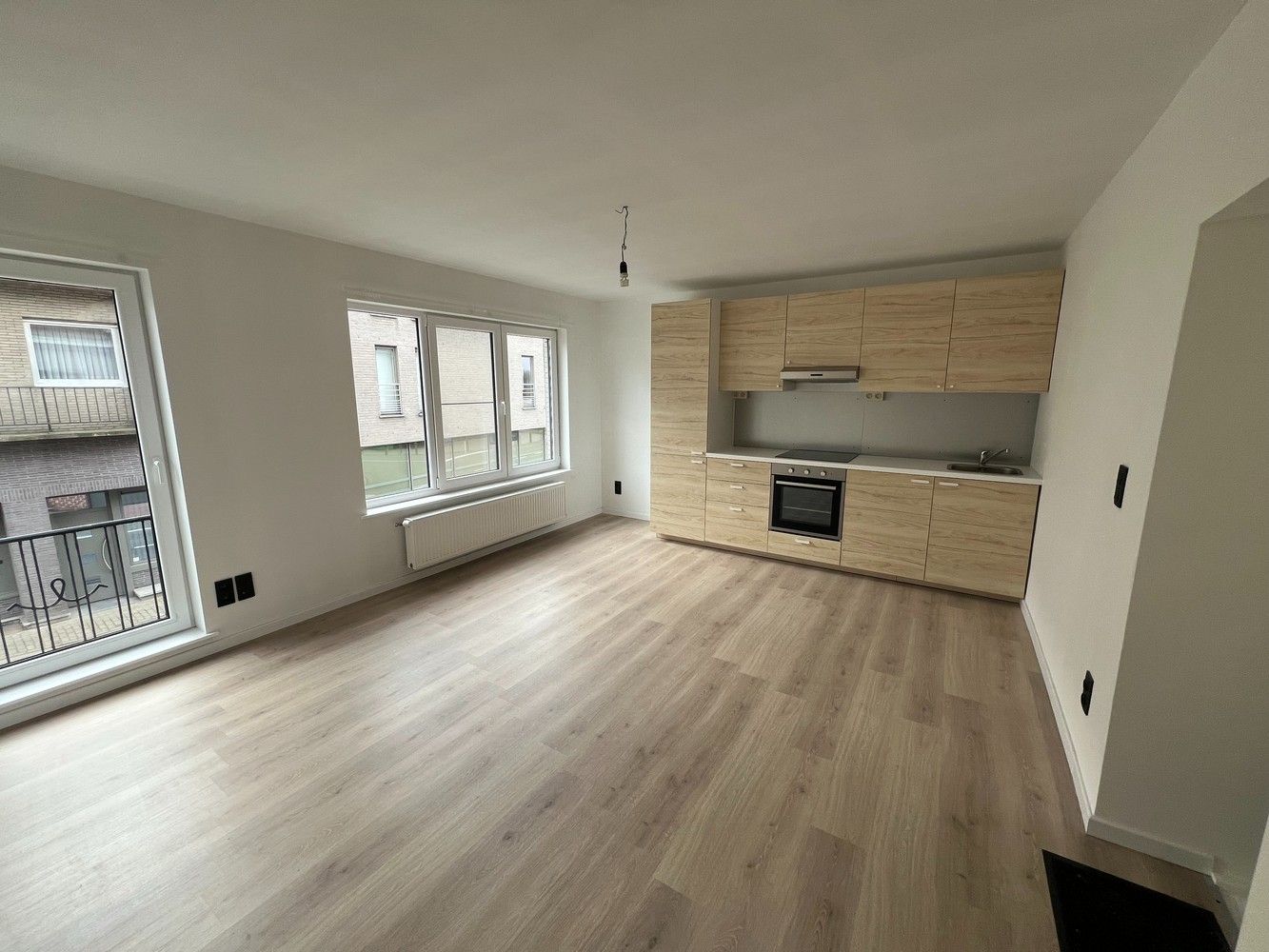 Gerenoveerd appartement met 3 slaapkamers en garage! foto 3