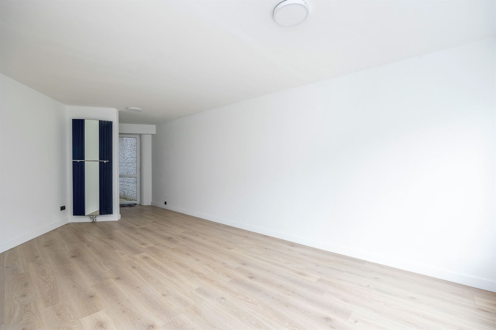 Gerenoveerd gelijkvloers 1-slaapkamer appartement met garagebox foto 5